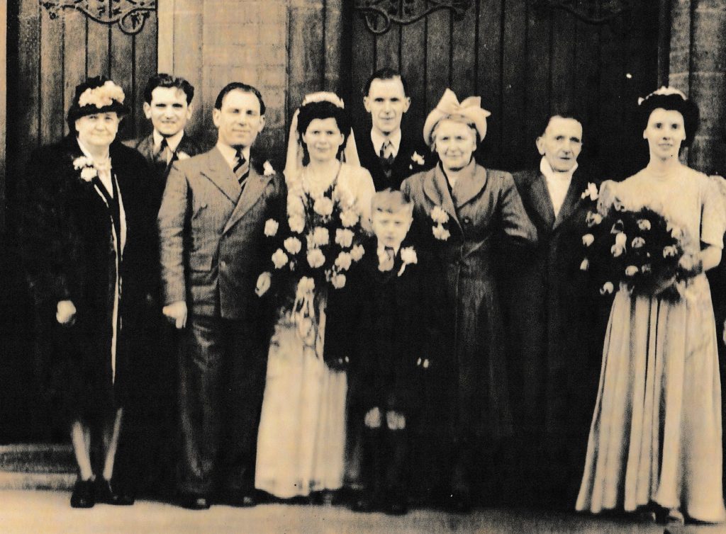 A wedding photo outside the church
