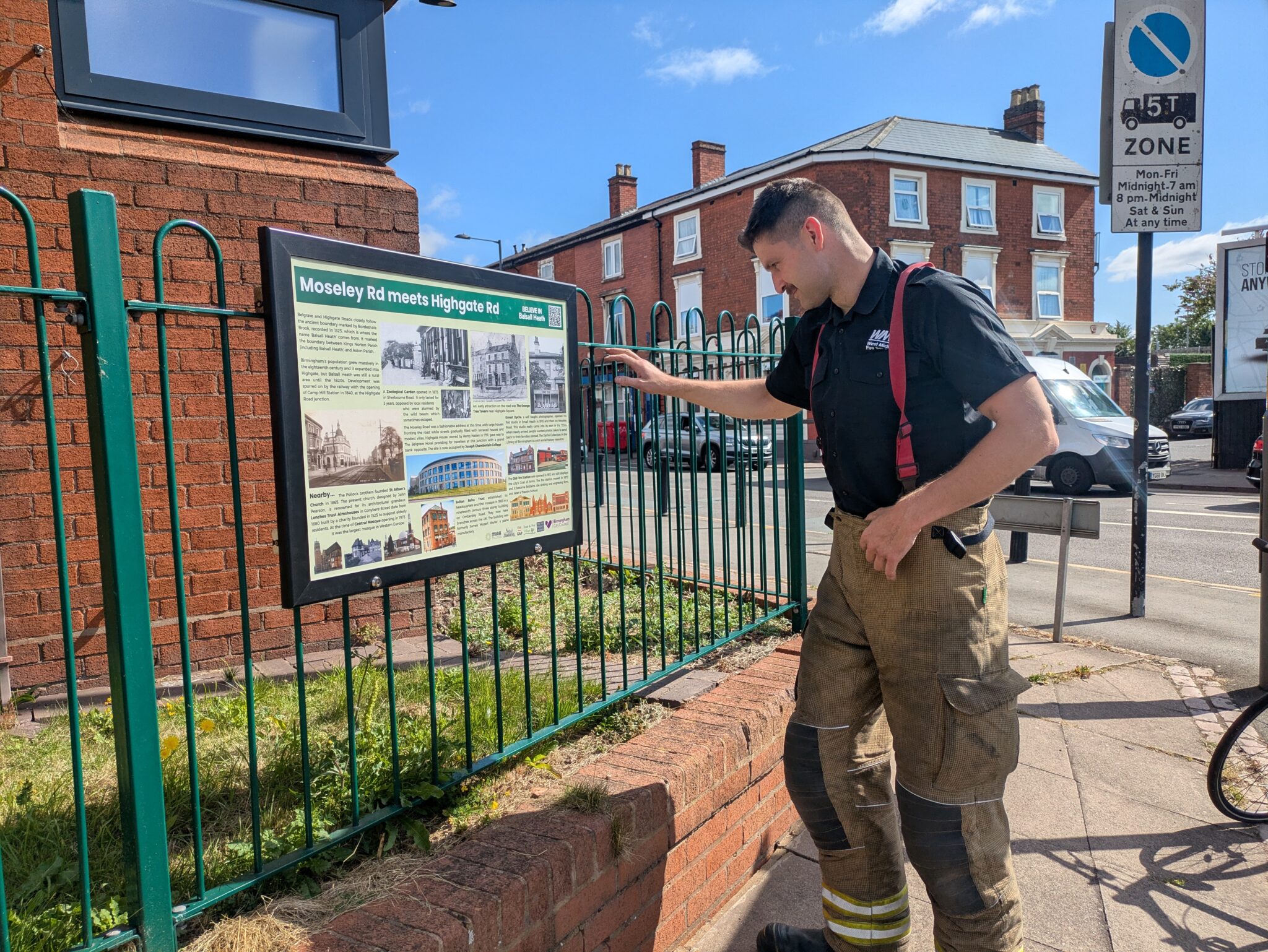 Fireman checks out History Interpretation Panel