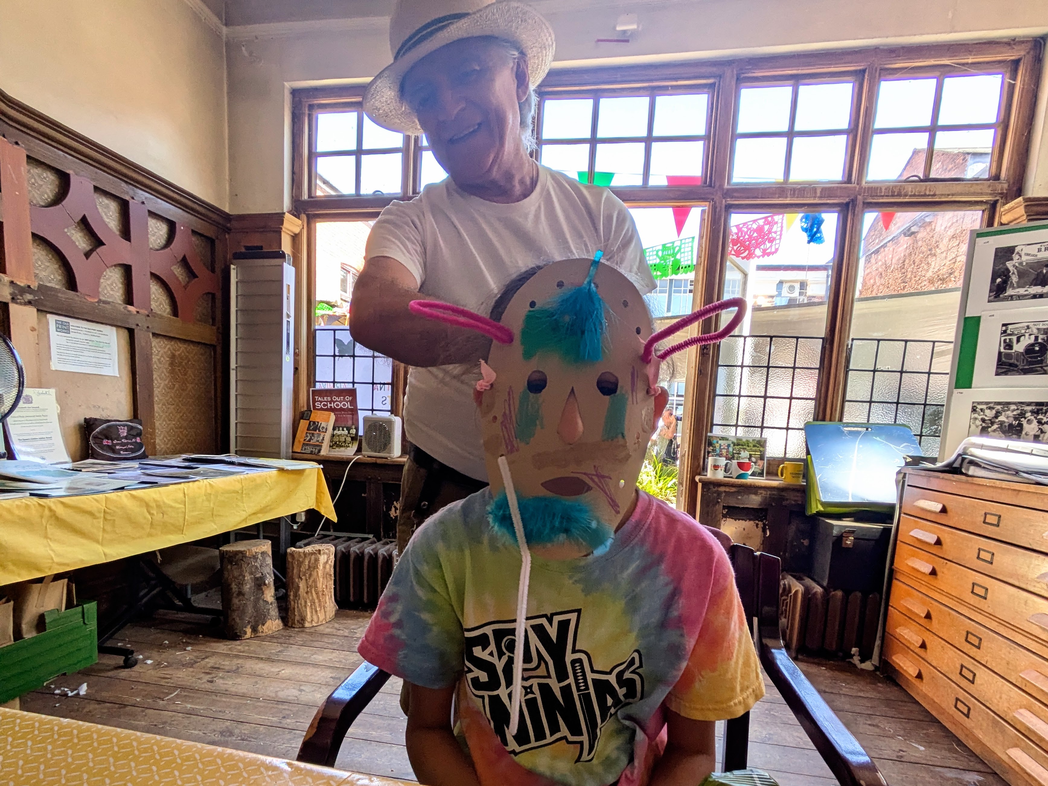 Alfredo helps make masks with the Local History Society July 2026 Second Saturday